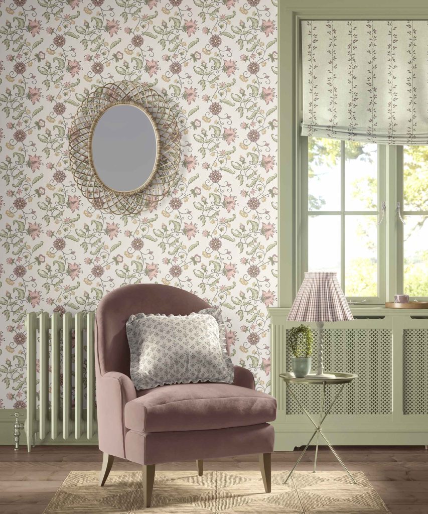 A cozy cottage scene featuring Wildwood Floral Wallpaper and accents from the Along the Garden Path collection