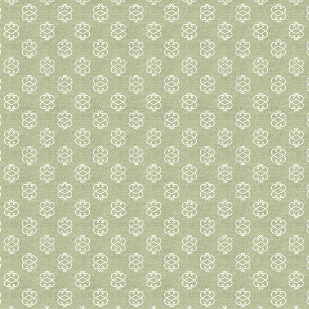 Ornamental pattern reminiscent of scrolling iron work on a garden gate